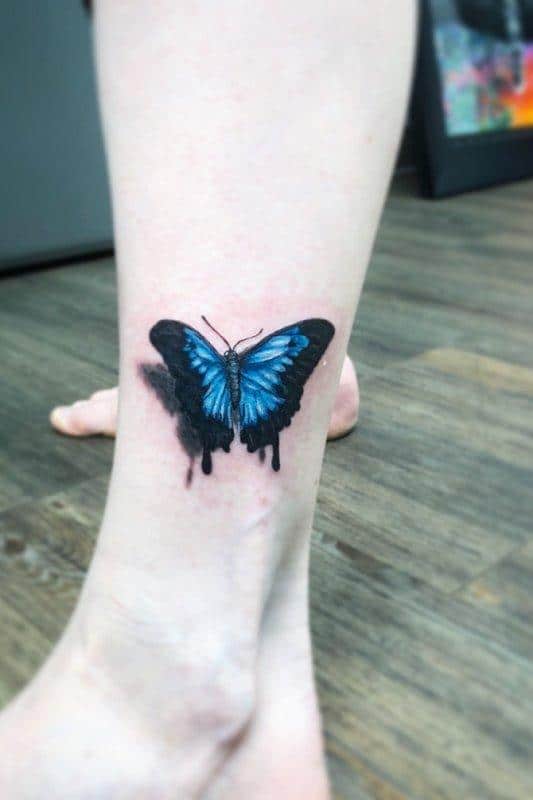 Beautiful Butterfly leg tattoo women