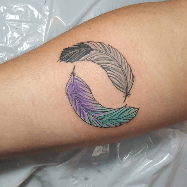 Dreamy peacock feather tattoos
