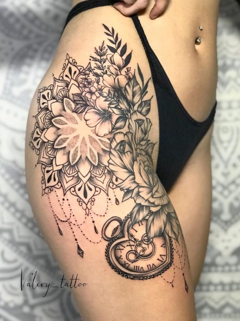 Fine Line Floral Design thigh tattoo