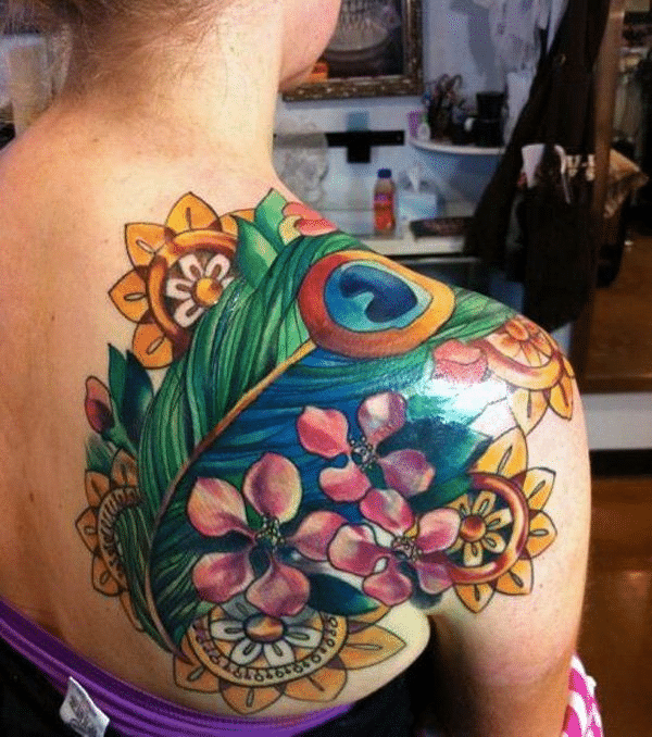 Floral peacock feather tattoos