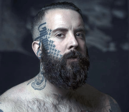 Geometric Face Tattoo