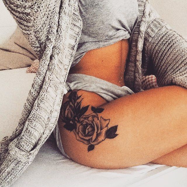 Hidden Thigh Rose tattoo