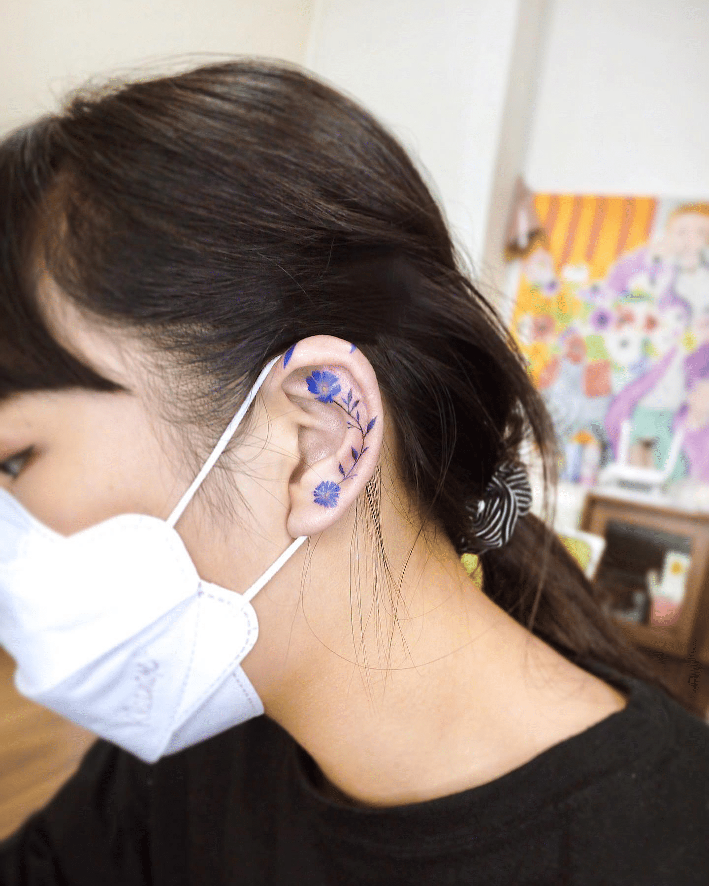 Lavender Across the Ear Tattoo