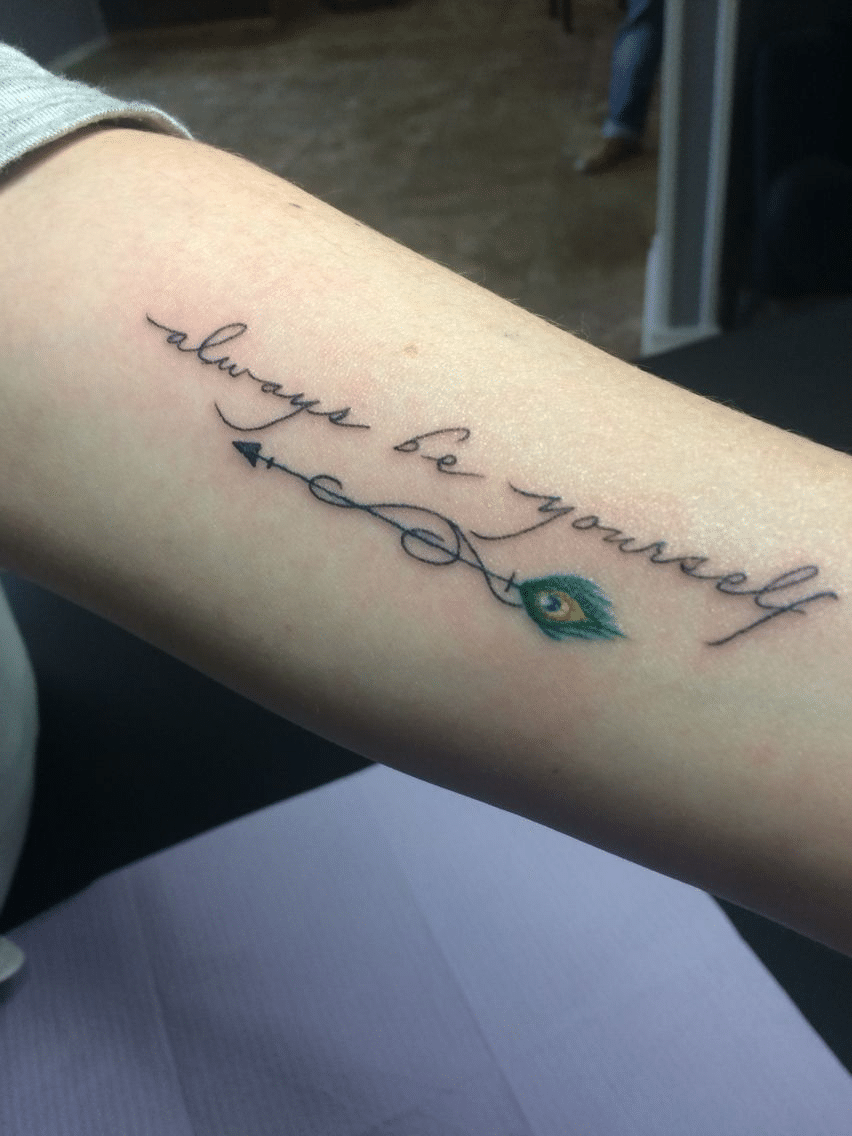 Peacock feather tattoos with words