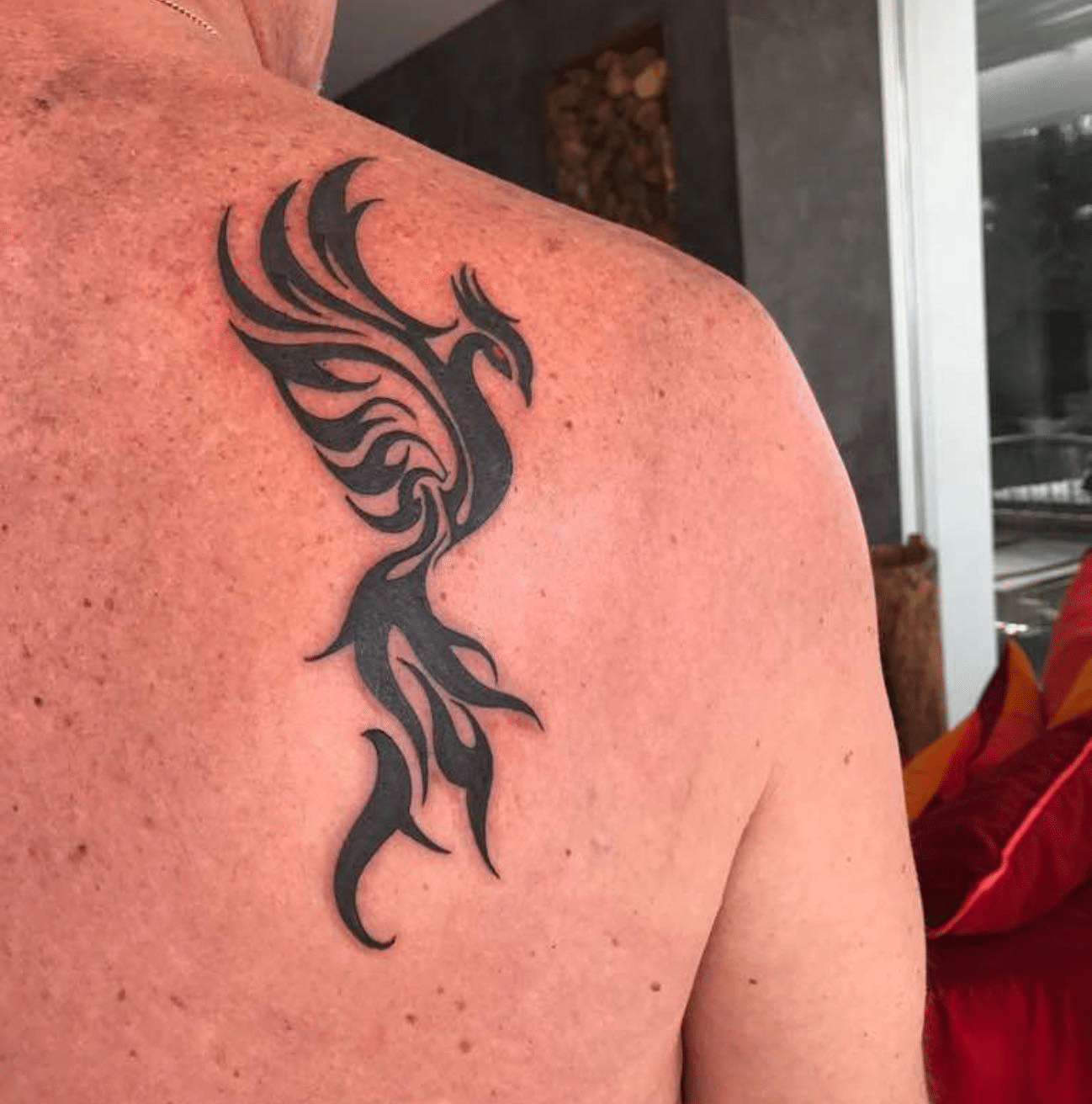 Tribal Phoenix Tattoo on the Shoulder