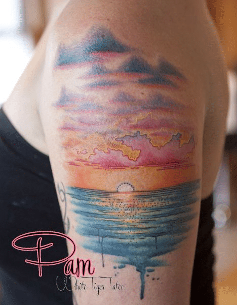 Watercolor sunset tattoo