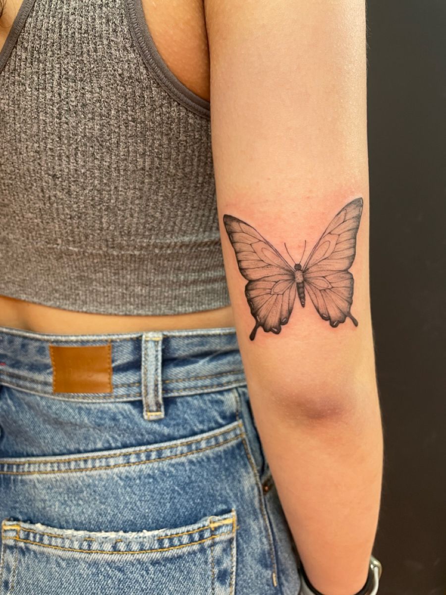 butterfly tattoo on Tricep