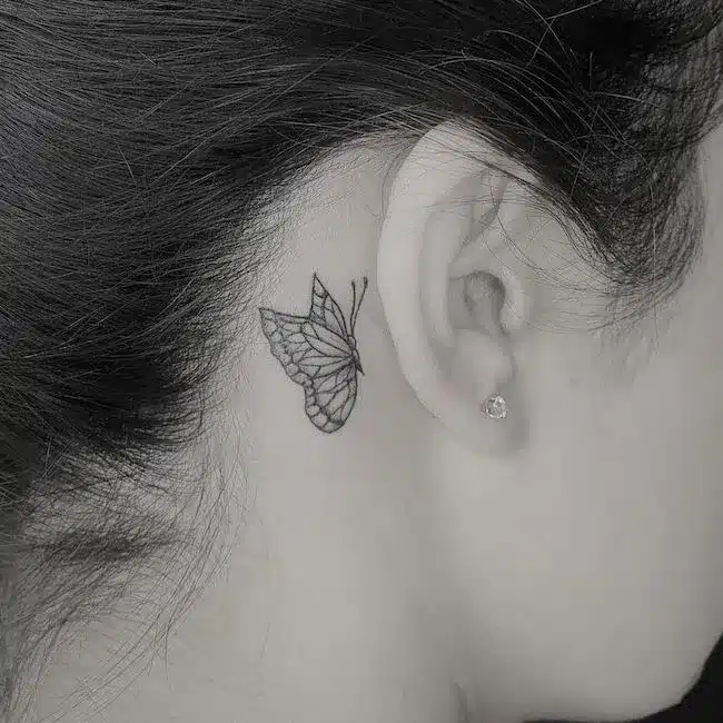 Behind the Ear white butterfly tattoo