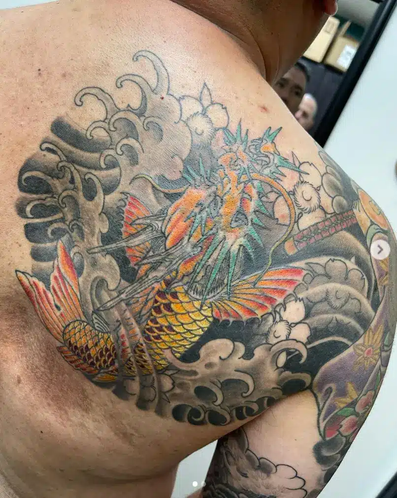 Rich detail fish dragon tattoo