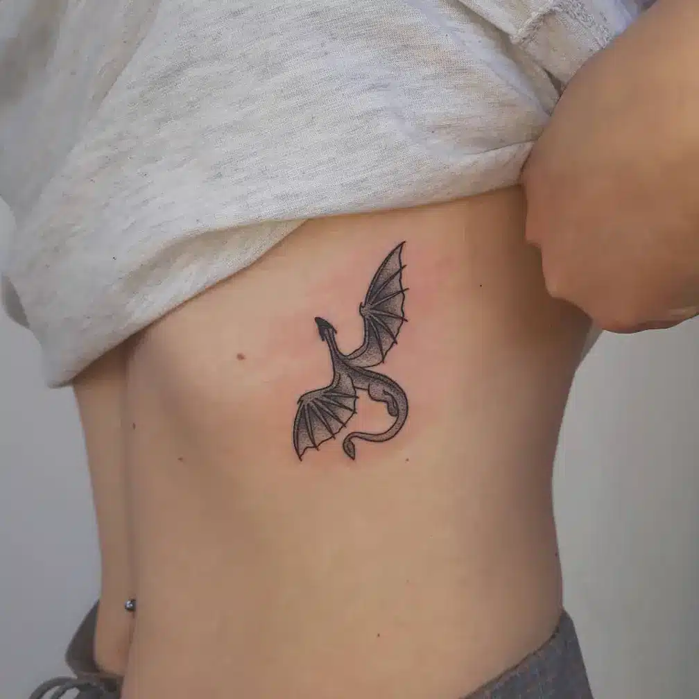 Tiny Dragon Tattoo on Torso