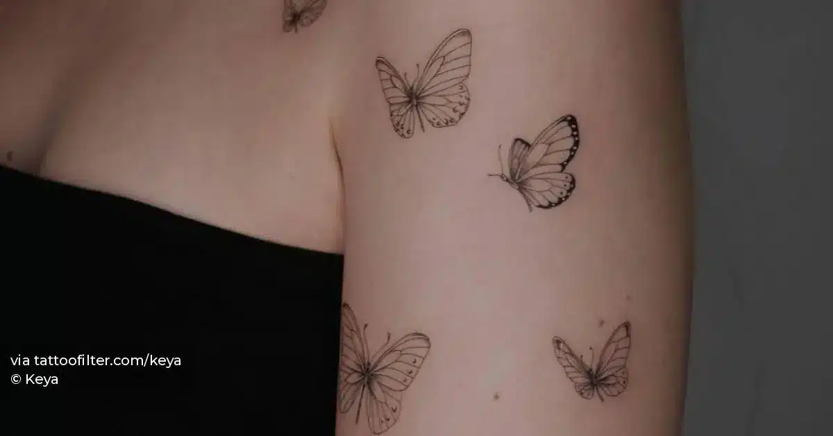Upper arm butterfly tattoo