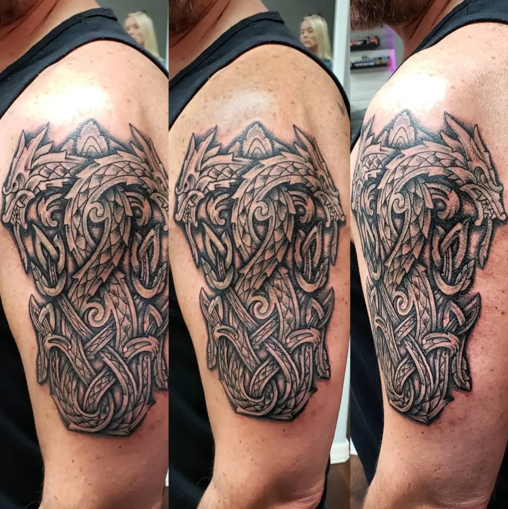 celtic dragon tattoo on arm