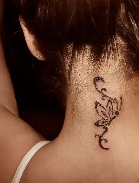 tribal butterfly tattoo on neck
