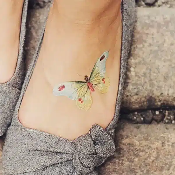 white butterfly foot Tattoo