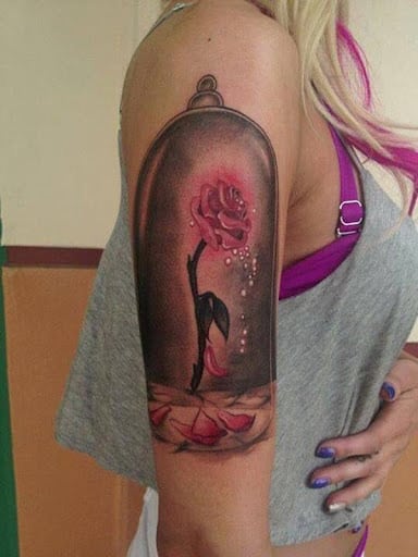 Enchanted red rose tattoo