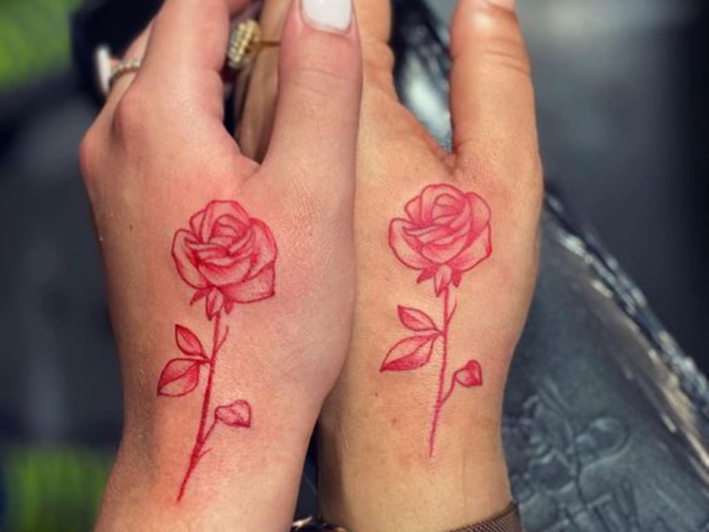 red rose tattoo meaning