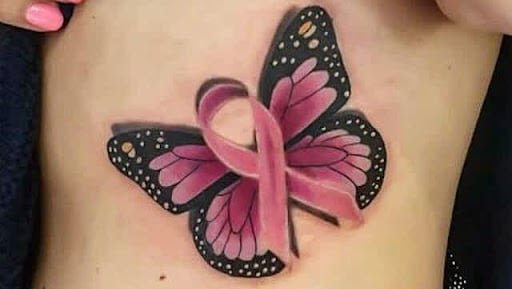Chest butterfly ribbon tattoo