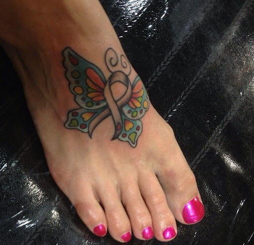 Foot butterfly tattoo