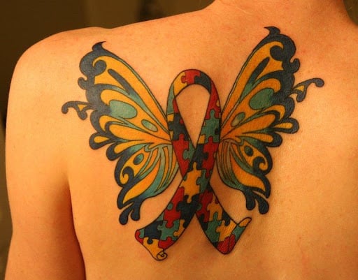 butterfly ribbon tattoo on Back