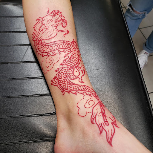 Red Dragon Tattoo on leg