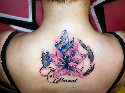 lily tattoo on back