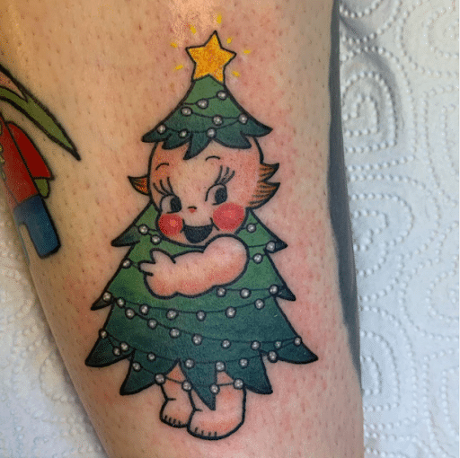 Playful Cartoon Christmas Tree Tattoo