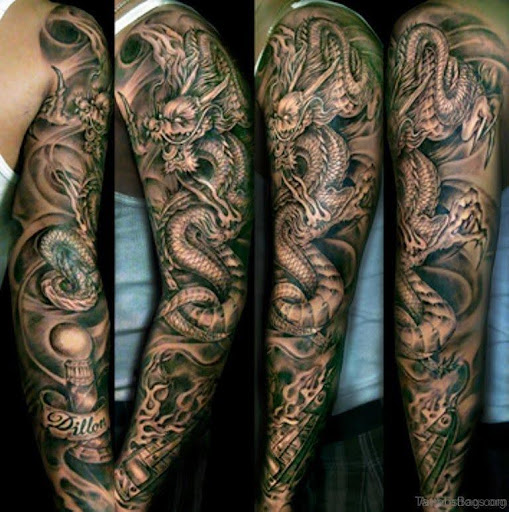 Black dragon tattoos on the arm