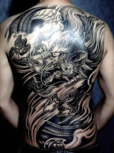 Black dragon tattoos on the back