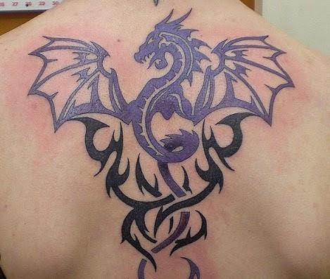 tribal dragon tattoo on back