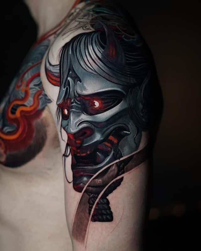 japanese mask tattoo on shoulder