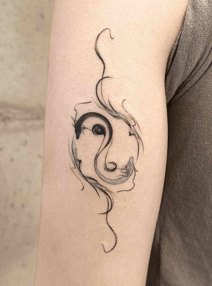 Arm With Yin Yang Dragon Tattoo Design