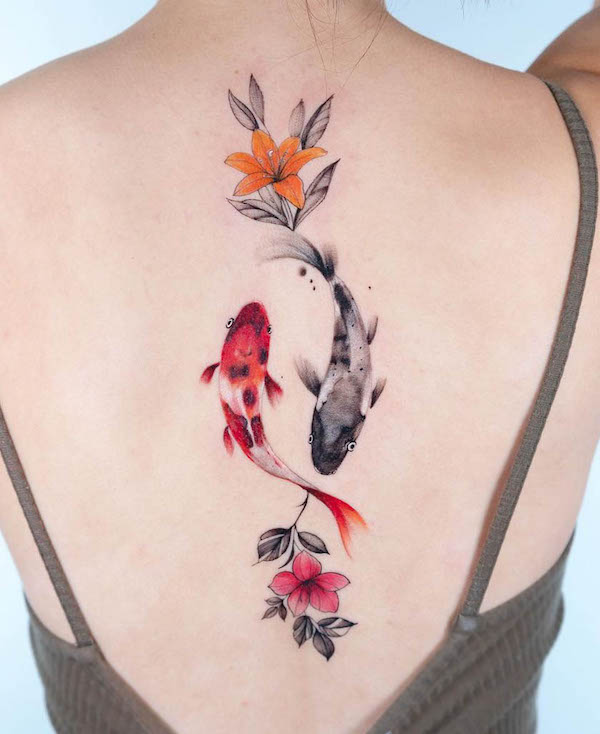 Koi Fish Tattoo on the back of a girl