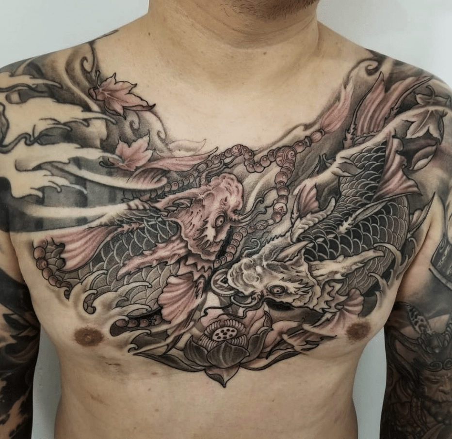 Dragon Fish Tattoo On The Chest