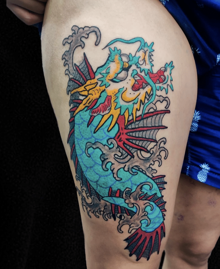 Leg With Dragonfish Tattoo