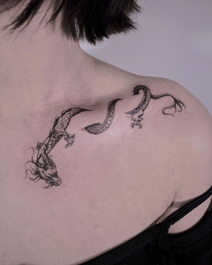 Minimalist Dragon Tattoo On The Clavicle