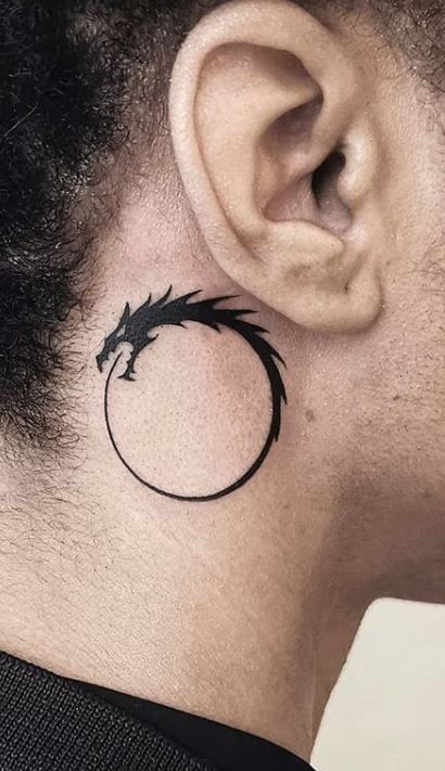 The Ear With Black Dragon Tattoo