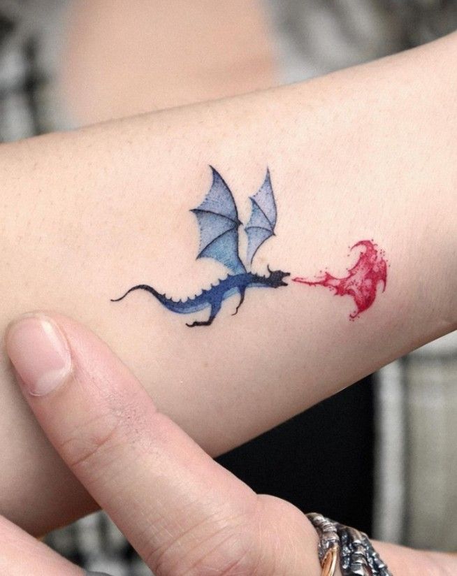 Tiny Dragon Tattoo On The Forearm