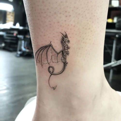 minimalist dragon tattoo ankle