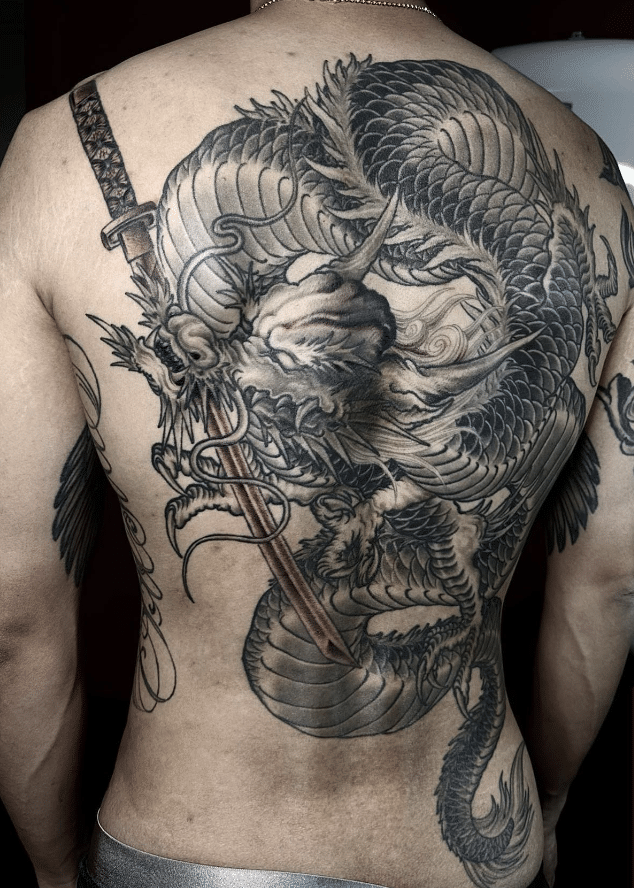 Back With Dragon Sword Tattoo
