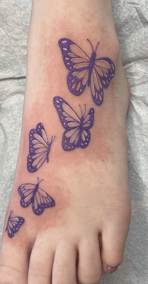 Beautiful Purple Butterfly Tattoo On Foot