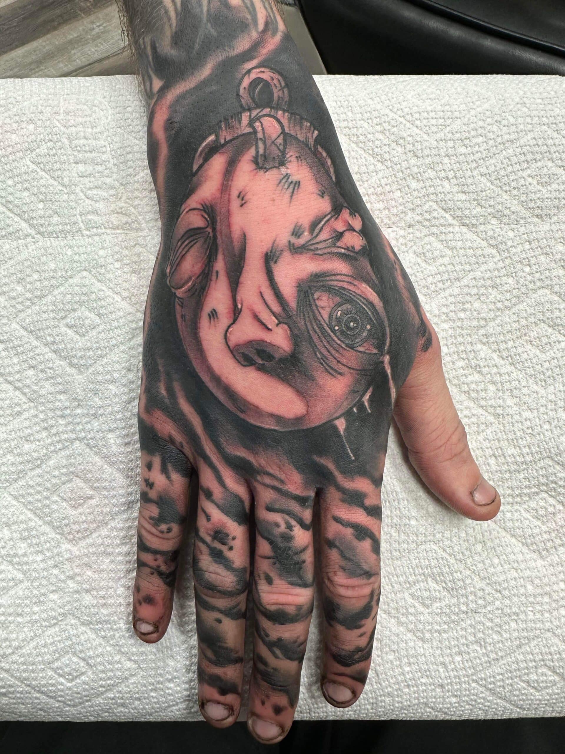 Behelit Berserk Hand Tattoo