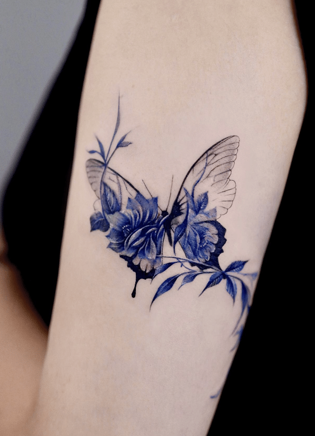 Blue Floral Butterfly Tattoo