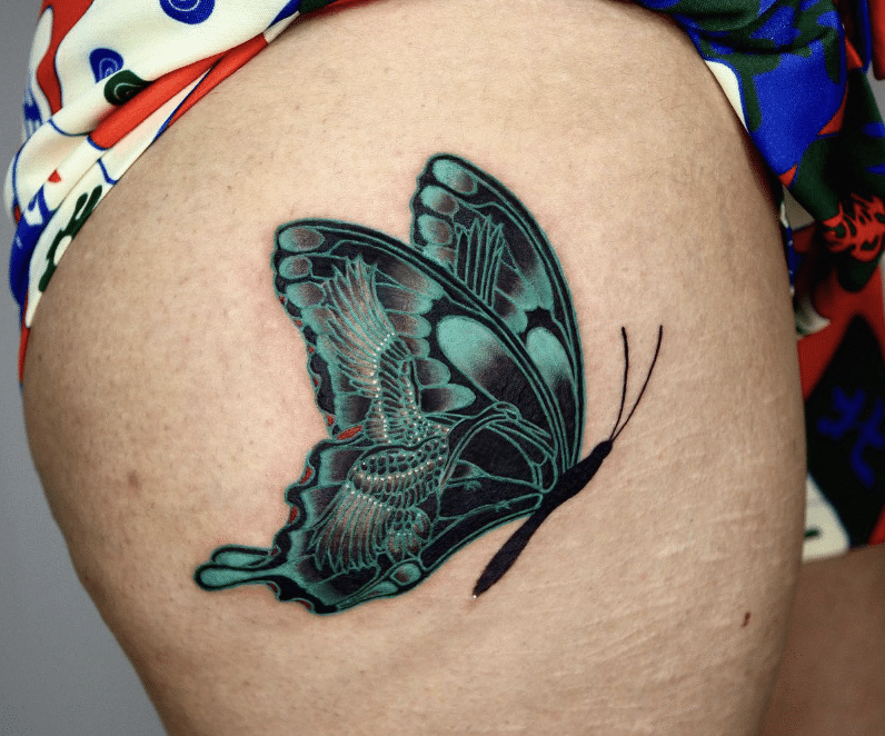 Crane In Butterfly Tattoo