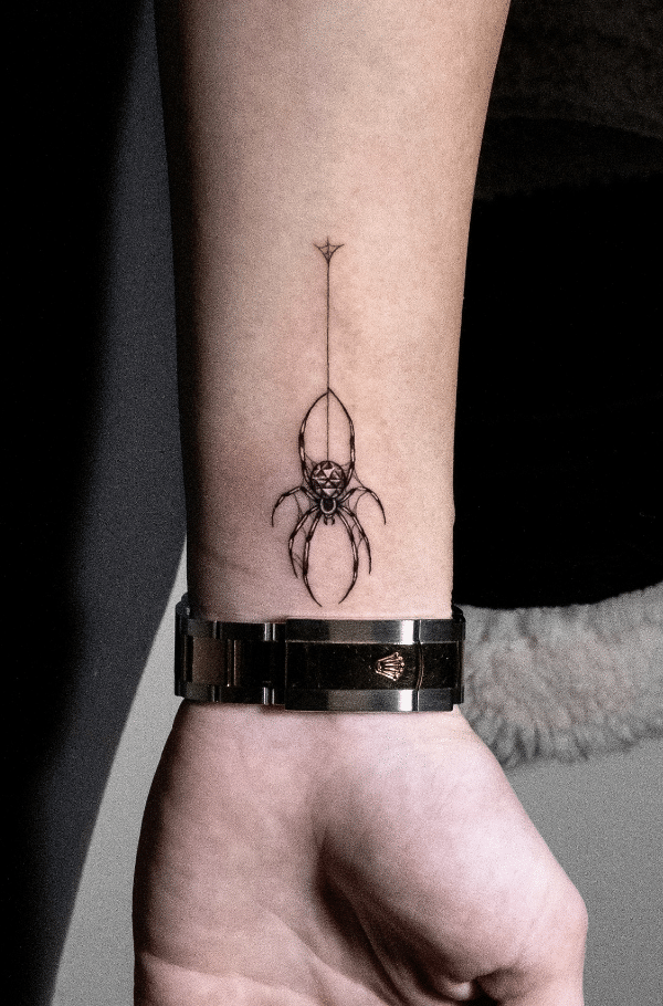 Cubic Spider Tattoo On Wrist