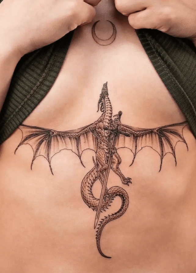 Dragon Flying With Sword Tattoo