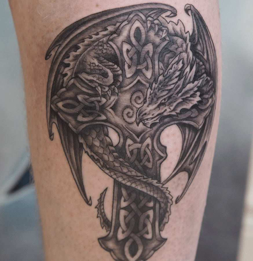 Dragon Resting On A Celtic Cross Celtic Dragon Tattoo