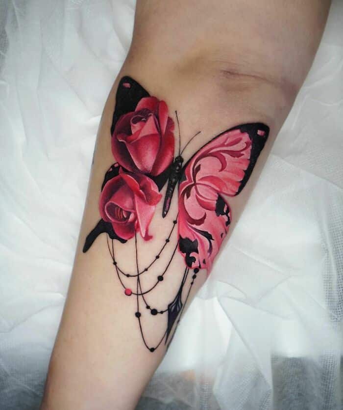 Elegant Pink Butterfly Tattoo On Leg