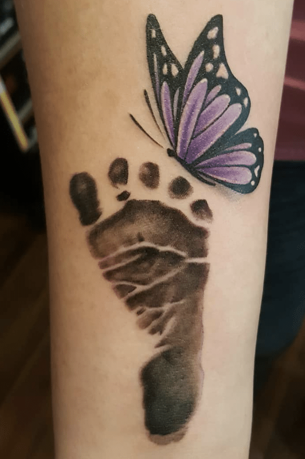 Footprint And Purple Butterfly Tattoo
