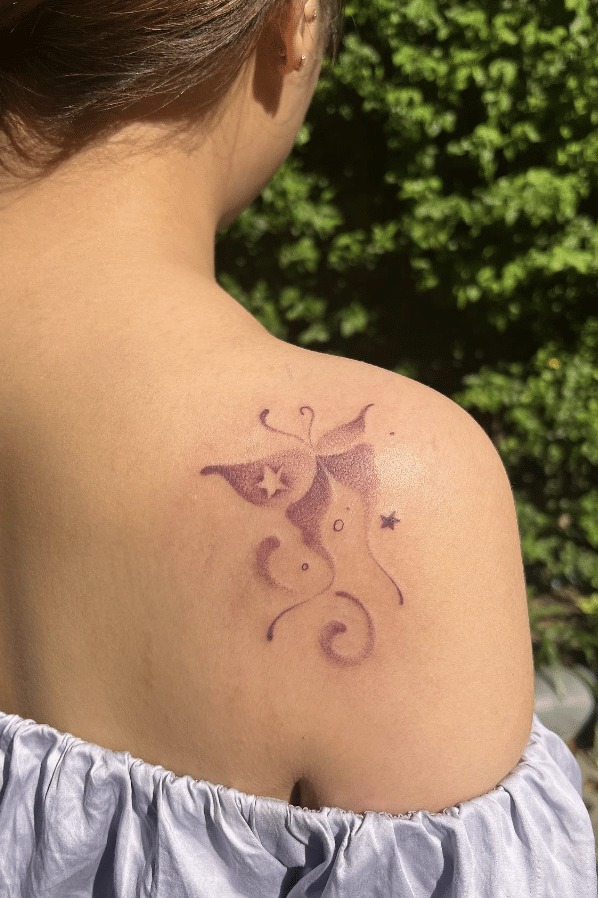 Grained Purple Butterfly Tattoo