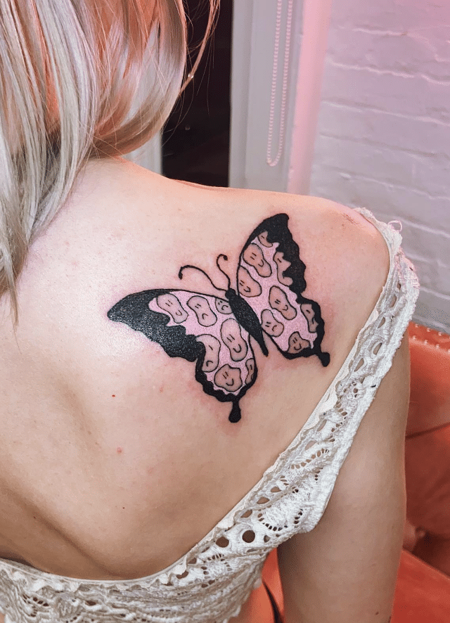 Happy And Sad Face Pink Butterfly Tattoo